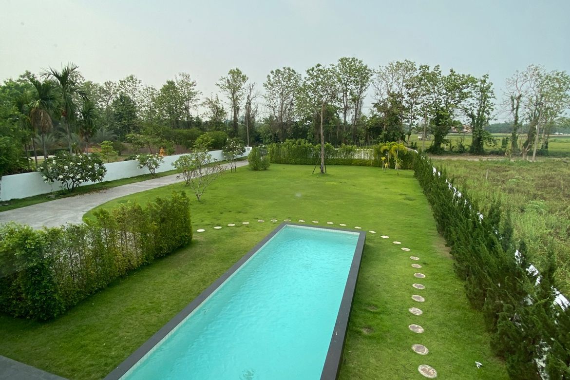 A modern home with pool for sale or rent at Green Vally Golf Course